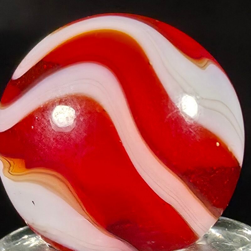 Akro Cherry Red Onyx W/ Auger .70 Mint