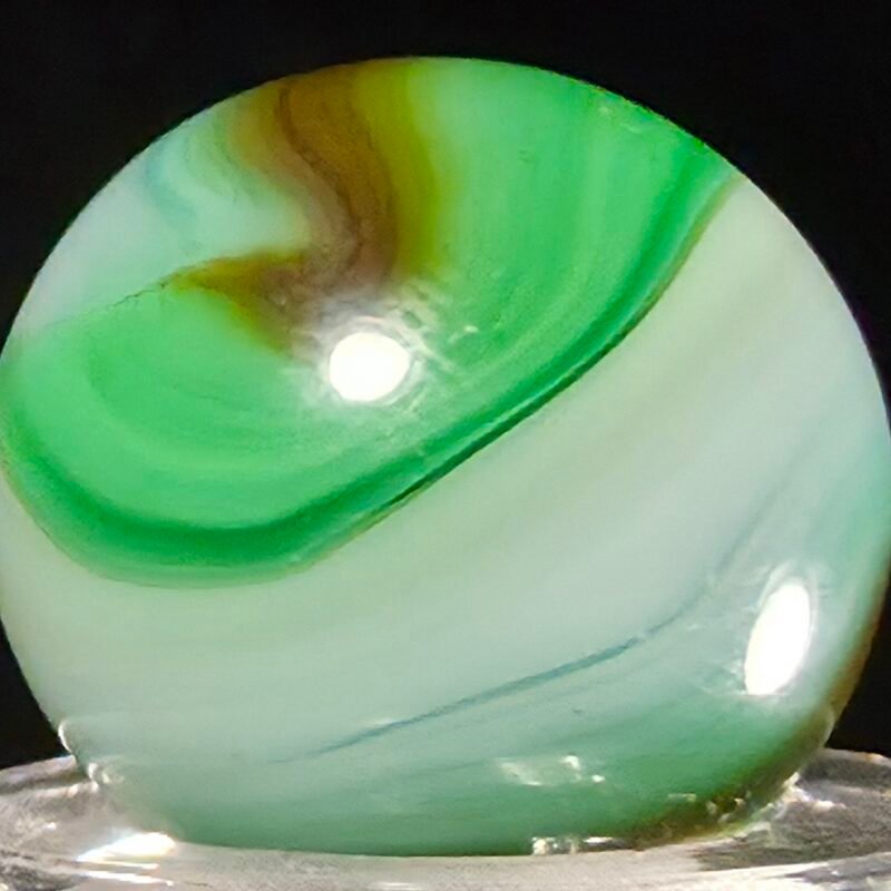 Akro Ringer W/ Burnt Brown .60 Mint 9.7